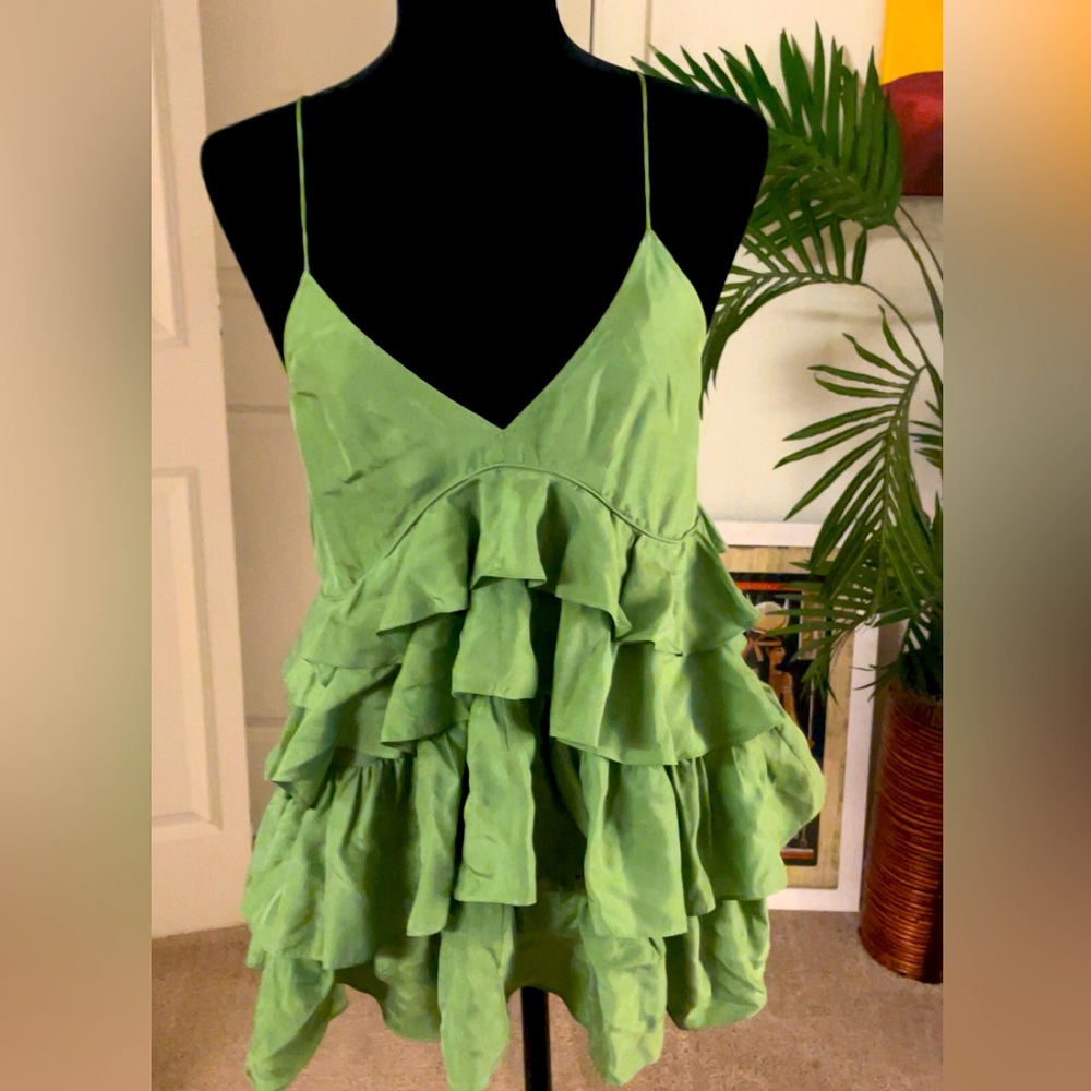Green ruffle shirt